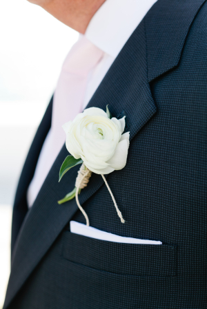 White-Rose-Boutonniere-Wrapped-in-Twine-300x449